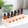Картинка Деревянная двухуровневая подставка (для 11 масел по 15 мл) от магазина dōTERRA